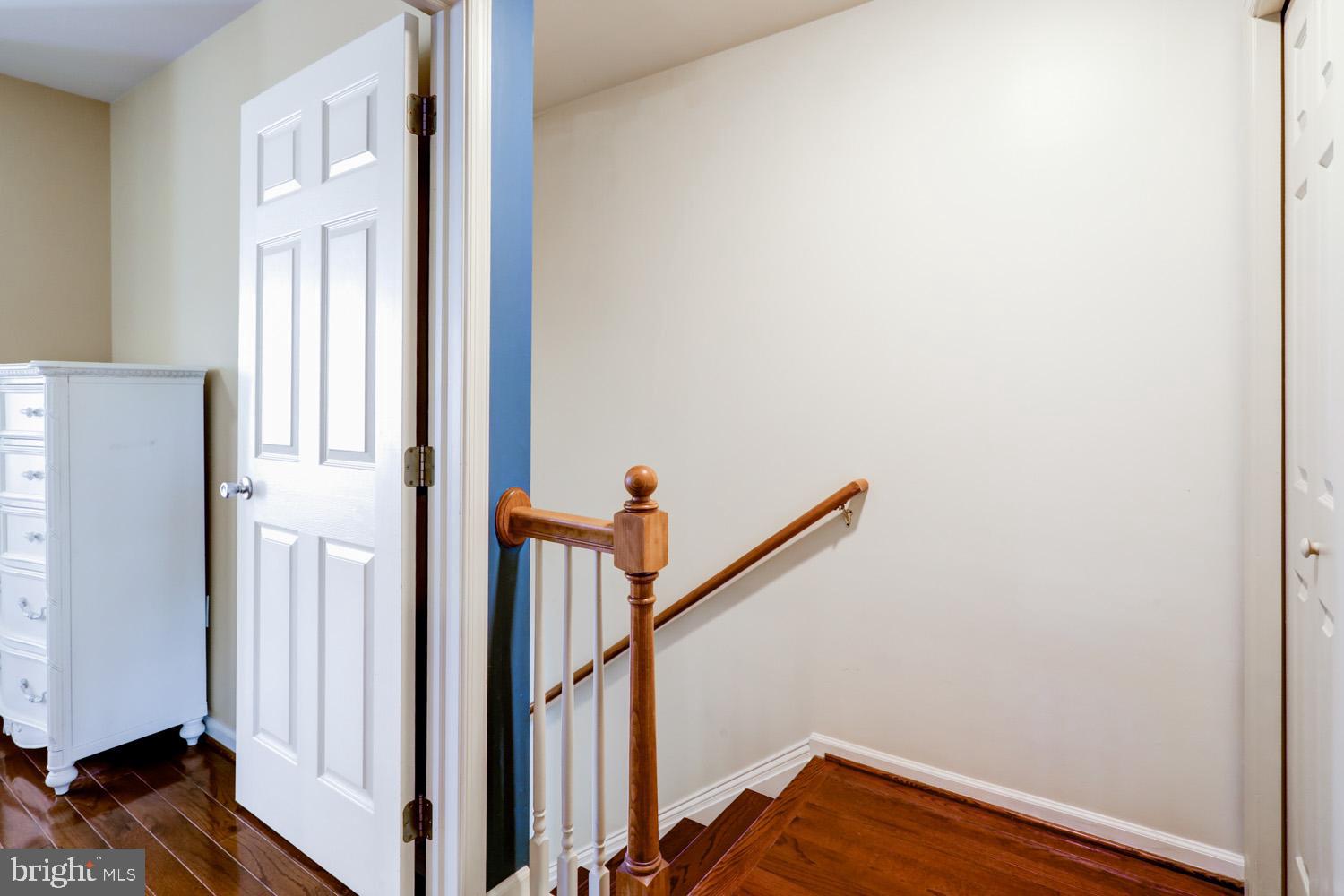 1006 Cobblestone Lane Lancaster, PA 17601 - Photo 22 of 38 a view of a hallway with wooden floor and staircase