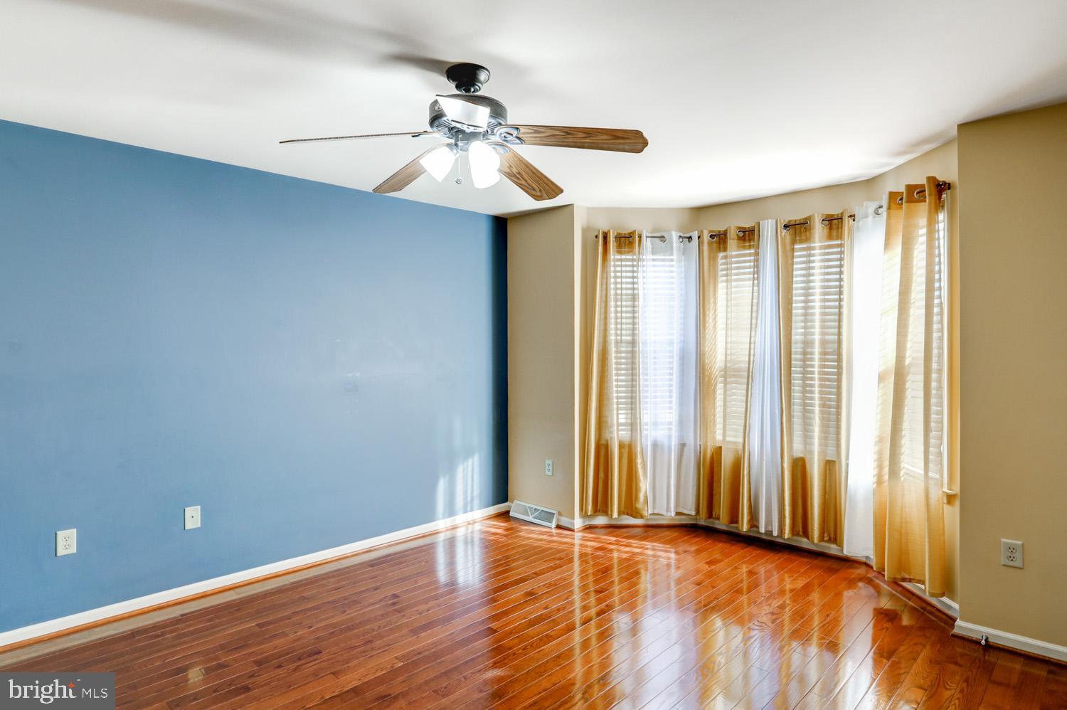 1006 Cobblestone Lane Lancaster, PA 17601 - Photo 23 of 38 wooden floor in an empty room with a window