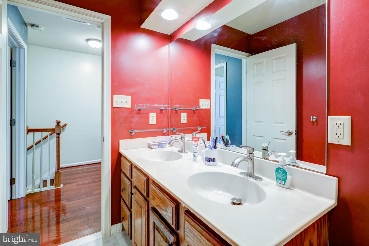 1006 Cobblestone Lane Lancaster, PA 17601 - Photo 26 of 38 a bathroom with a sink and a mirror
