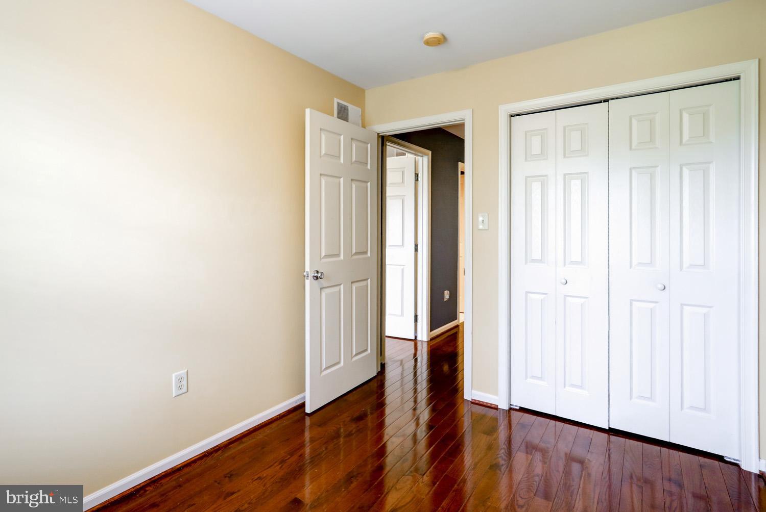 1006 Cobblestone Lane Lancaster, PA 17601 - Photo 28 of 38 an empty room with wooden floor and a window