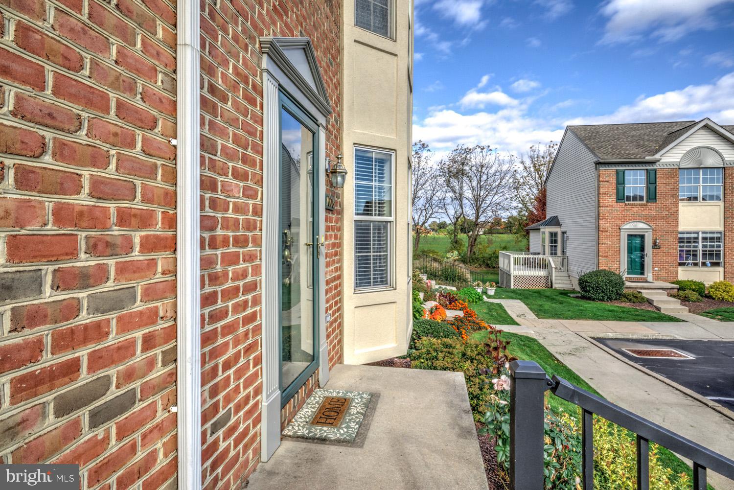 1006 Cobblestone Lane Lancaster, PA 17601 - Photo 4 of 38 a front view of a house with a yard