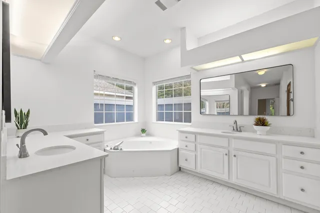 a room with cabinets and a large window