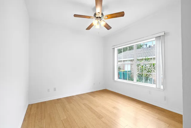 a view of a lake with a yard and a slide