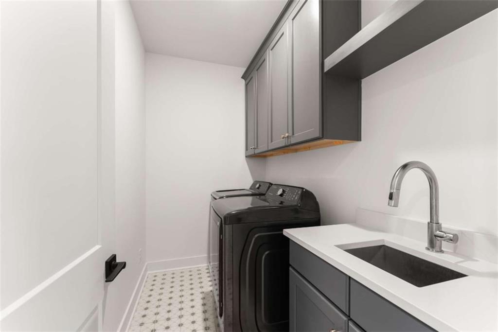 338 Sugarview Road Sugar Hill, GA 30518 - Photo 42 of 74 a view of a kitchen with sink and cabinets