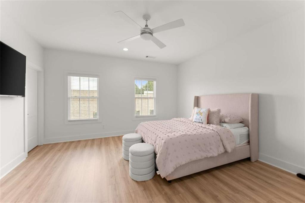 338 Sugarview Road Sugar Hill, GA 30518 - Photo 46 of 74 a bedroom with a bed and a window