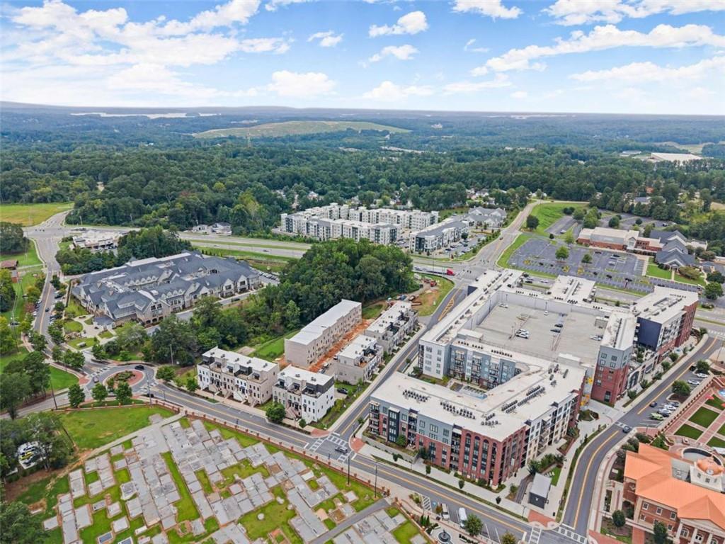 338 Sugarview Road Sugar Hill, GA 30518 - Photo 57 of 74 an aerial view of a city with lots of residential buildings