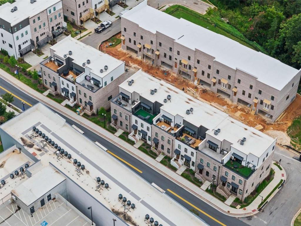 338 Sugarview Road Sugar Hill, GA 30518 - Photo 60 of 74 a large building with a city street