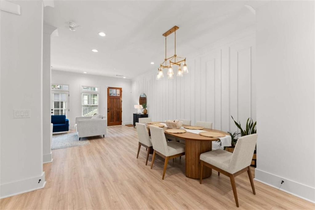 338 Sugarview Road Sugar Hill, GA 30518 - Photo 9 of 74 a view of a room with furniture and wooden floor