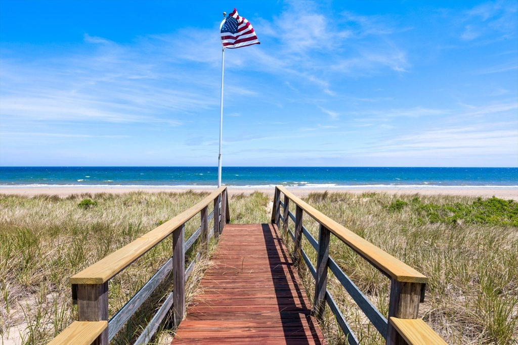 213 Phillips Road Sandwich, MA 02563 - Photo 9 of 36 a view of a balcony with an ocean
