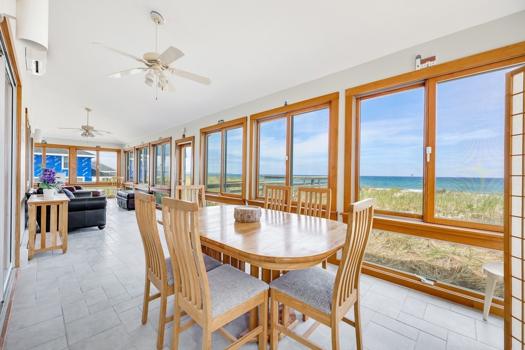 213 Phillips Road Sandwich, MA 02563 - Photo 10 of 36 a dining room with furniture water view and a large window