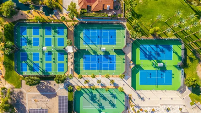 a view of a city with mountains in the background