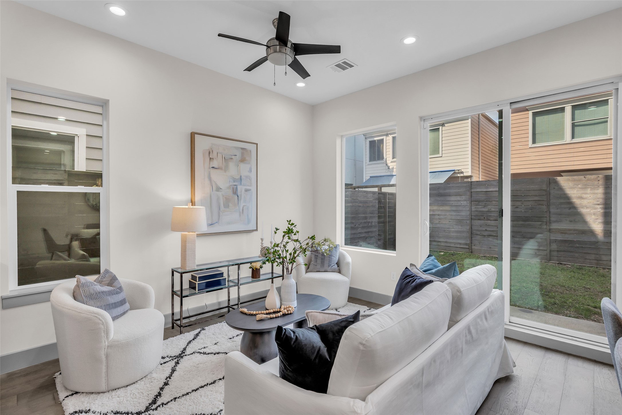 1207 East 28th Street Houston, TX 77009 - Photo 15 of 38 a living room with furniture and a large window