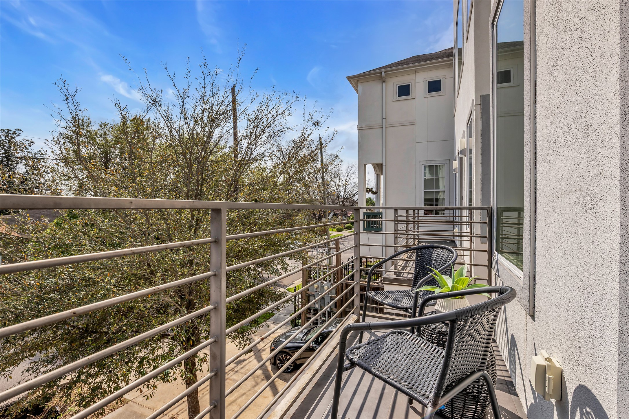 1207 East 28th Street Houston, TX 77009 - Photo 25 of 38 a view of a balcony with chairs and wooden fence