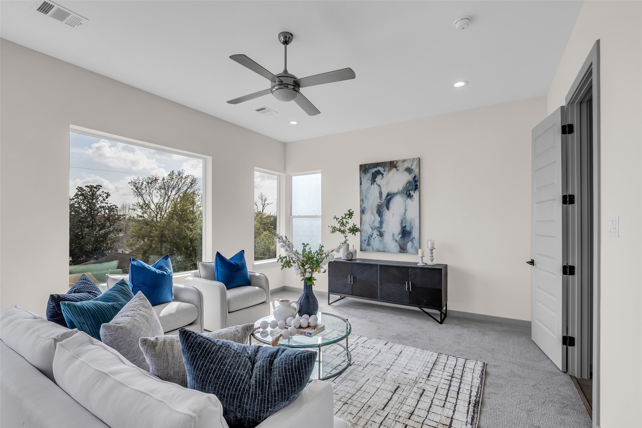 1207 East 28th Street Houston, TX 77009 - Photo 34 of 38 a living room with furniture and a large window