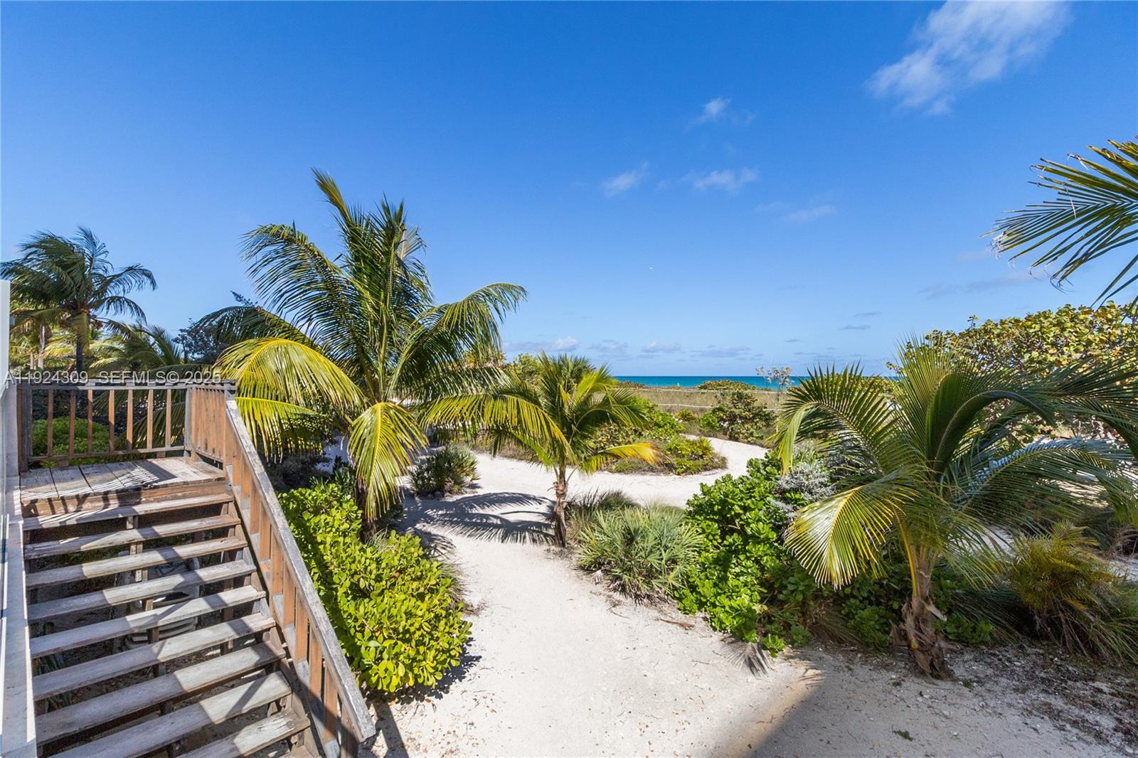 9225 Collins Avenue, Unit 612 Surfside, FL 33154 - Photo 37 of 38 a view of a backyard with swimming pool