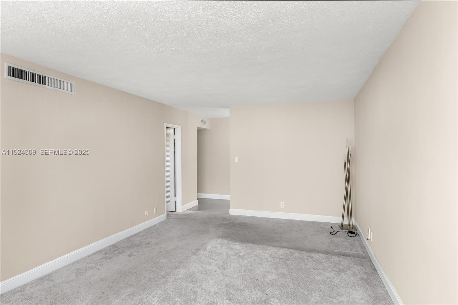 9225 Collins Avenue, Unit 612 Surfside, FL 33154 - Photo 10 of 38 a view of an empty room