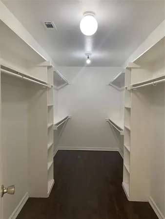 a view of a room with racks on the wall