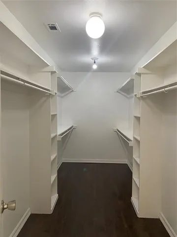 a view of a room with racks on the wall