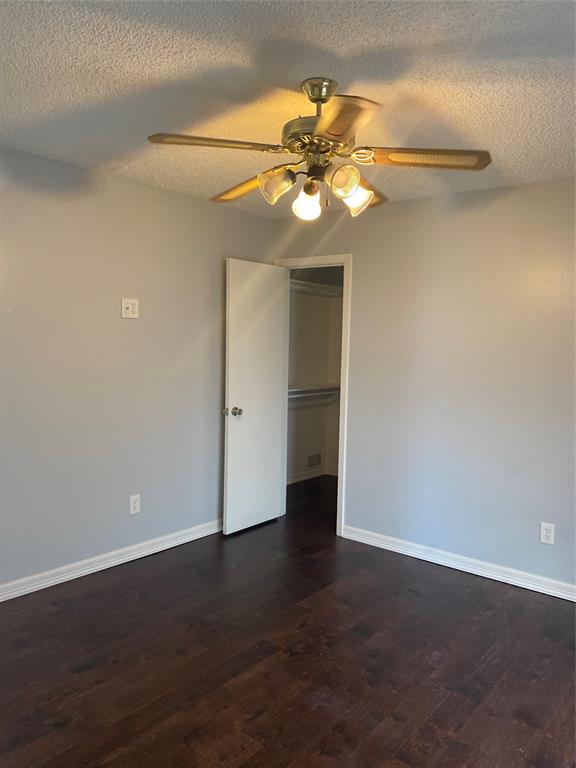 6005 Black Berry Lane Dallas, TX 75248 - Photo 19 of 22 a view of an empty room with a fan