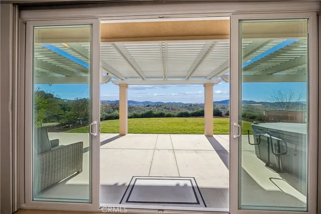 a view of a swimming pool with a porch