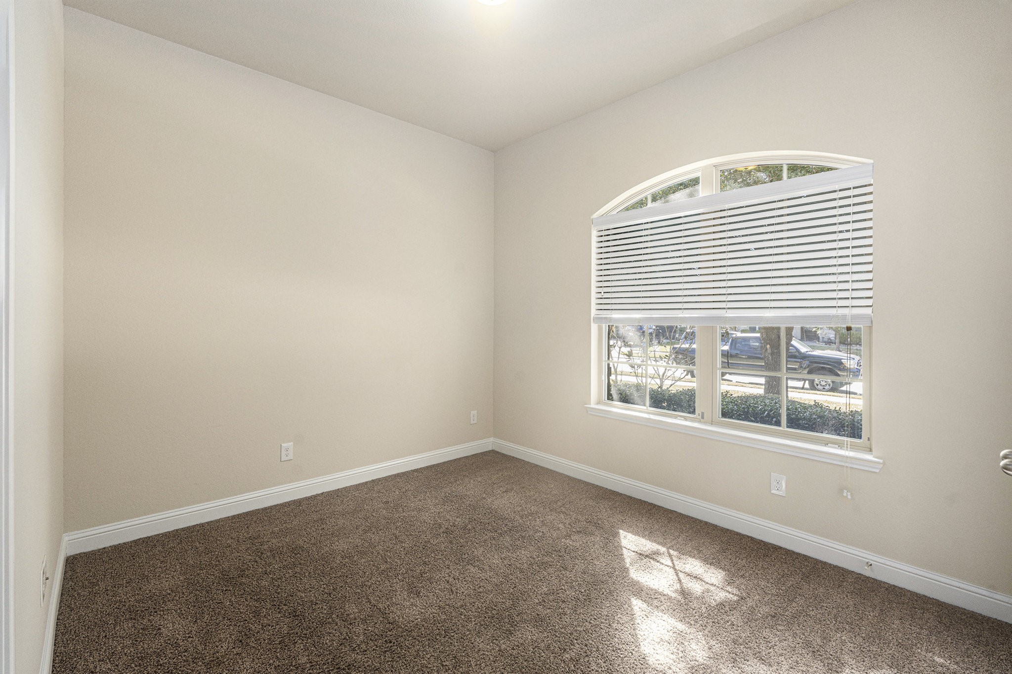 18614 Rimini Ridge Court Cypress, TX 77429 - Photo 22 of 35 an empty room with a window