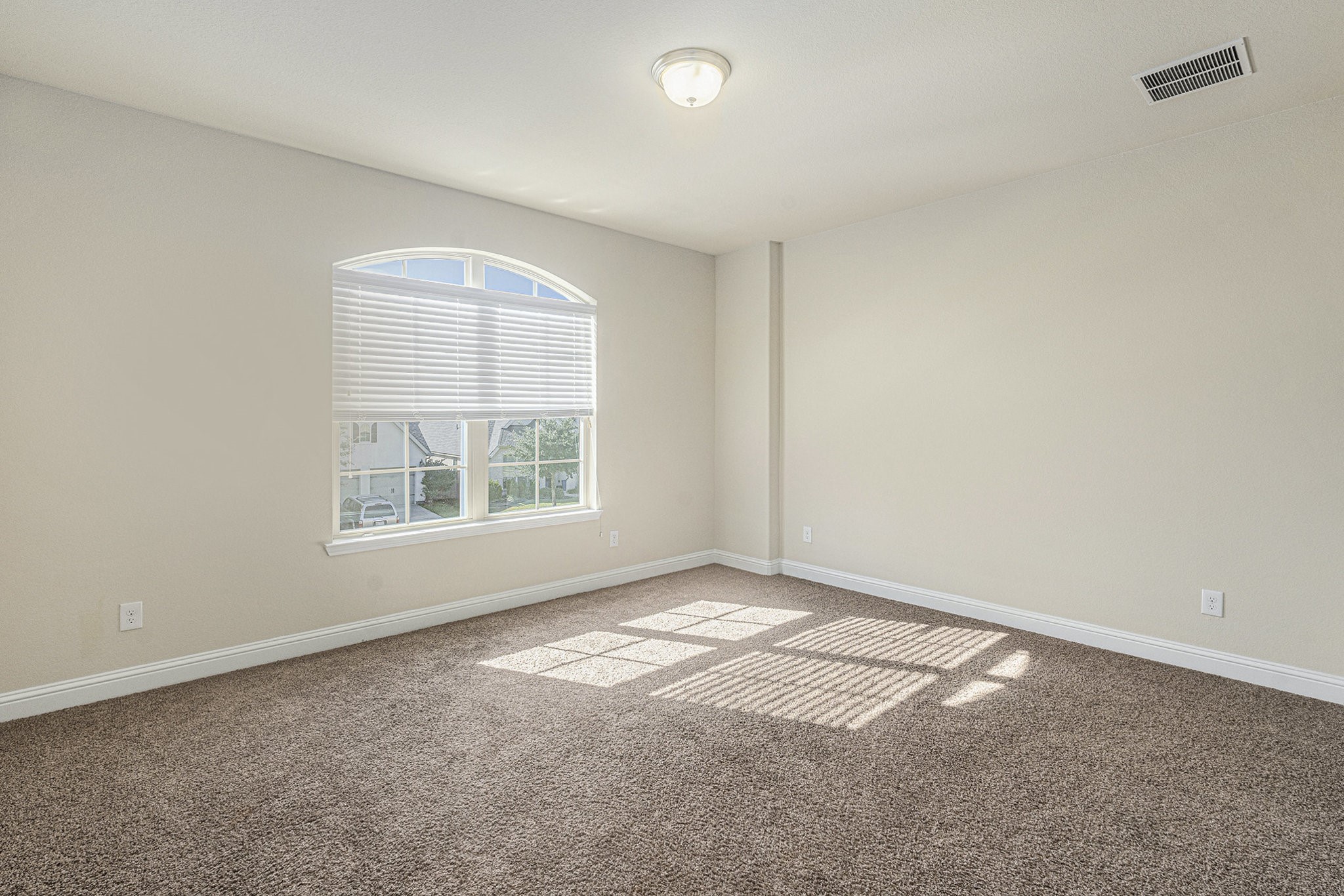 18614 Rimini Ridge Court Cypress, TX 77429 - Photo 24 of 35 an empty room with a window