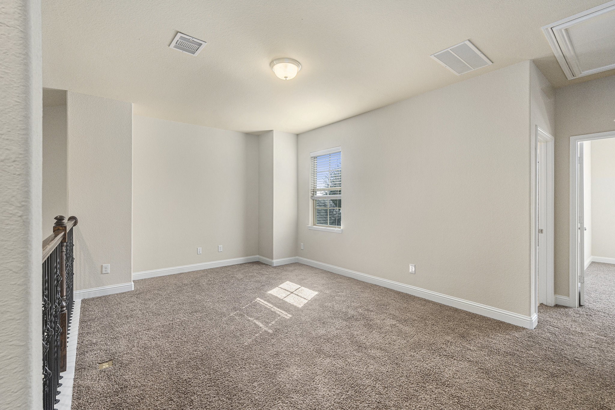 18614 Rimini Ridge Court Cypress, TX 77429 - Photo 27 of 35 a view of an empty room with a window
