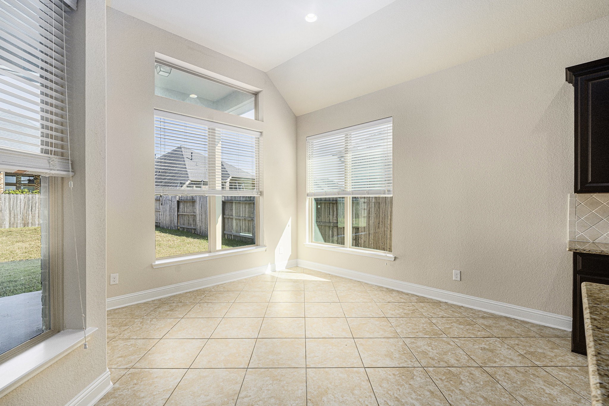 18614 Rimini Ridge Court Cypress, TX 77429 - Photo 8 of 35 a view of an empty room with a window