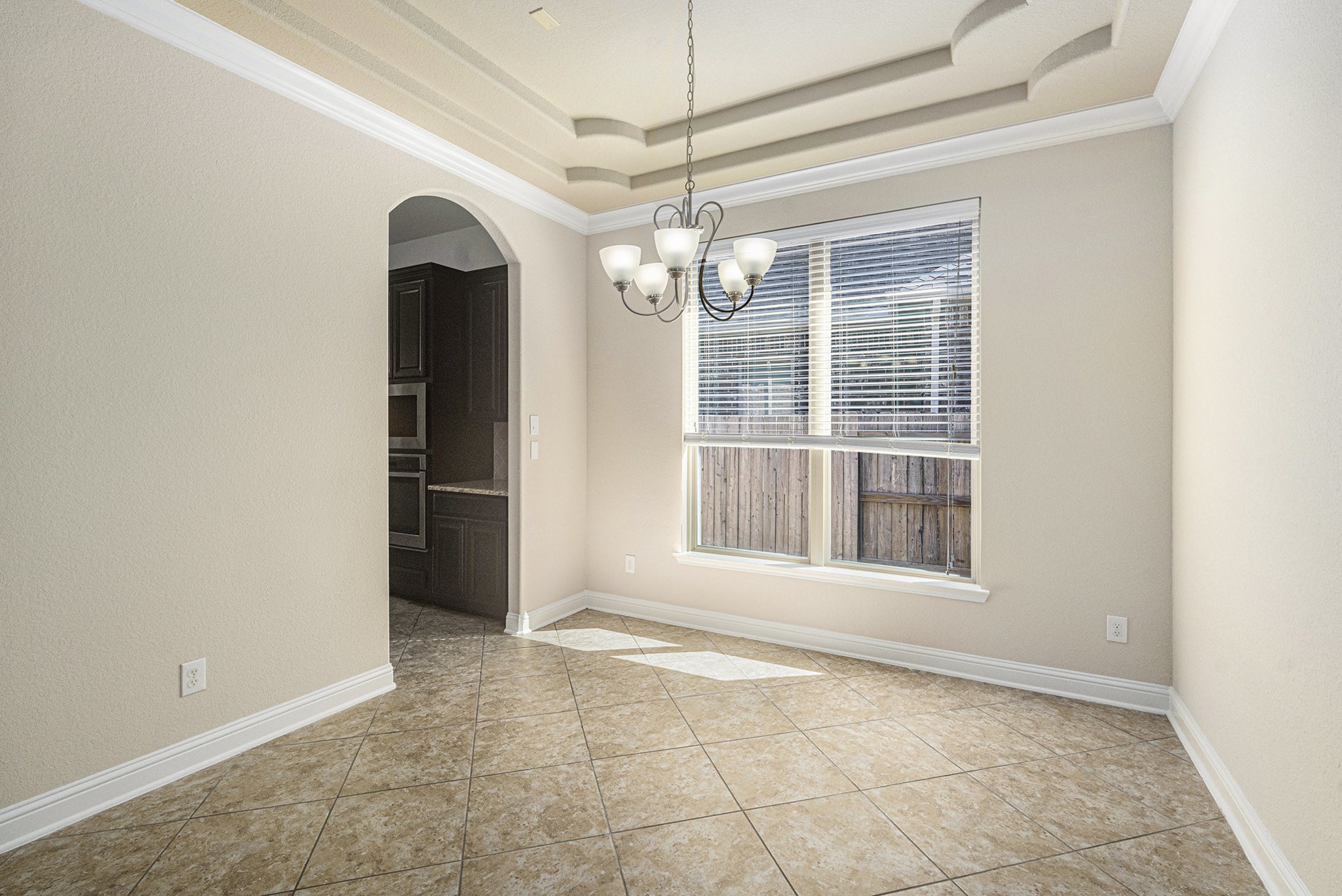 18614 Rimini Ridge Court Cypress, TX 77429 - Photo 9 of 35 a view of an empty room with a window