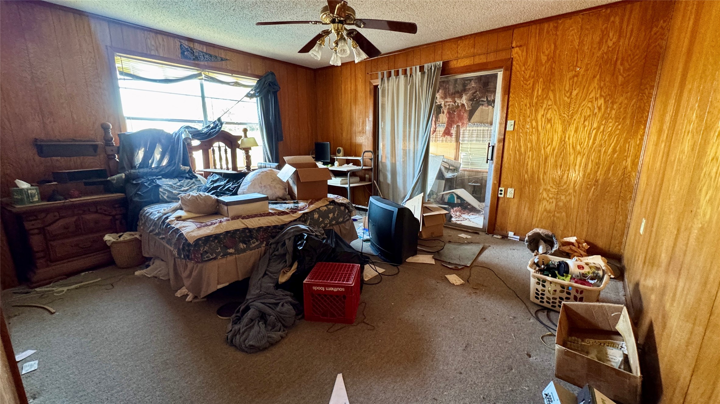4617 County Road 459B Freeport, TX 77541 - Photo 11 of 12 a bedroom with furniture and a window