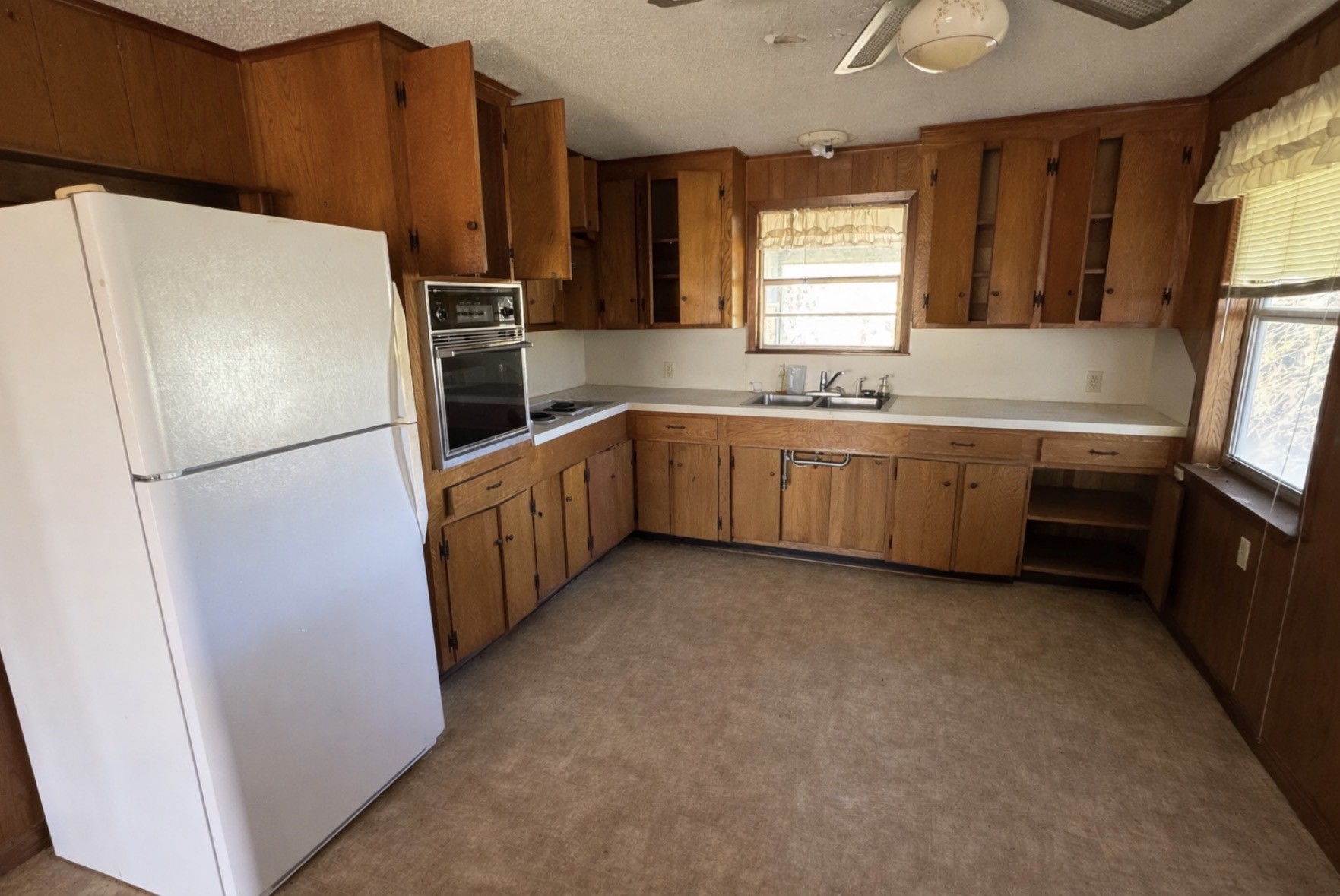 4617 County Road 459B Freeport, TX 77541 - Photo 7 of 12 a kitchen with stainless steel appliances a refrigerator sink and microwave