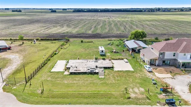 a view of a lake with a yard