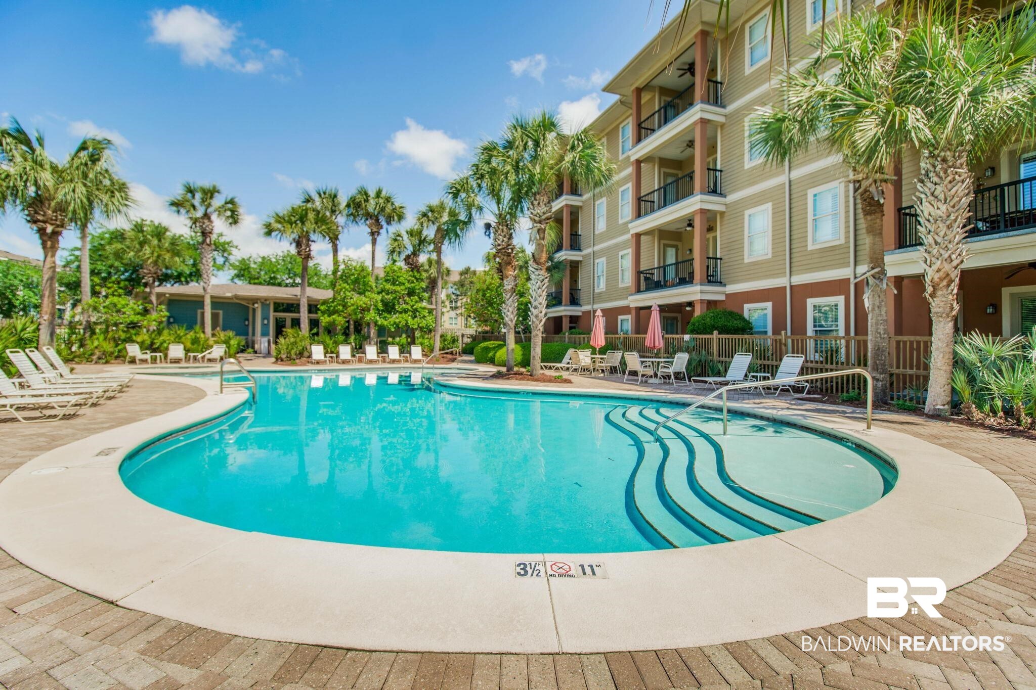 1430 Regency Road, Unit I201 Gulf Shores, AL 36542 - Photo 24 of 34 View of swimming pool featuring a patio