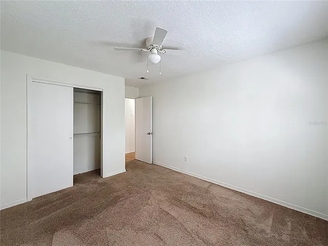 an empty room with a bathroom