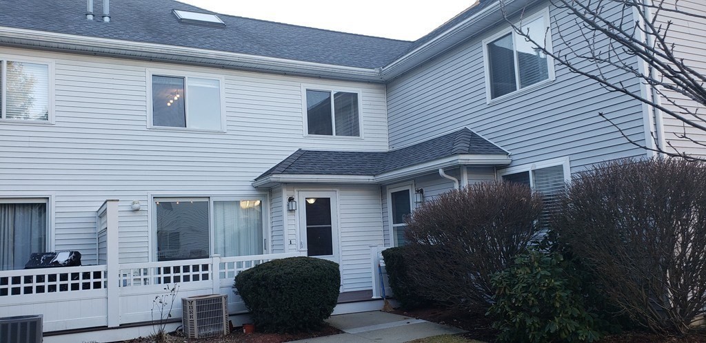 360 Littleton Road, Unit G10 Chelmsford, MA 01824 - Photo 20 of 20 a view of a house with backyard and sitting area