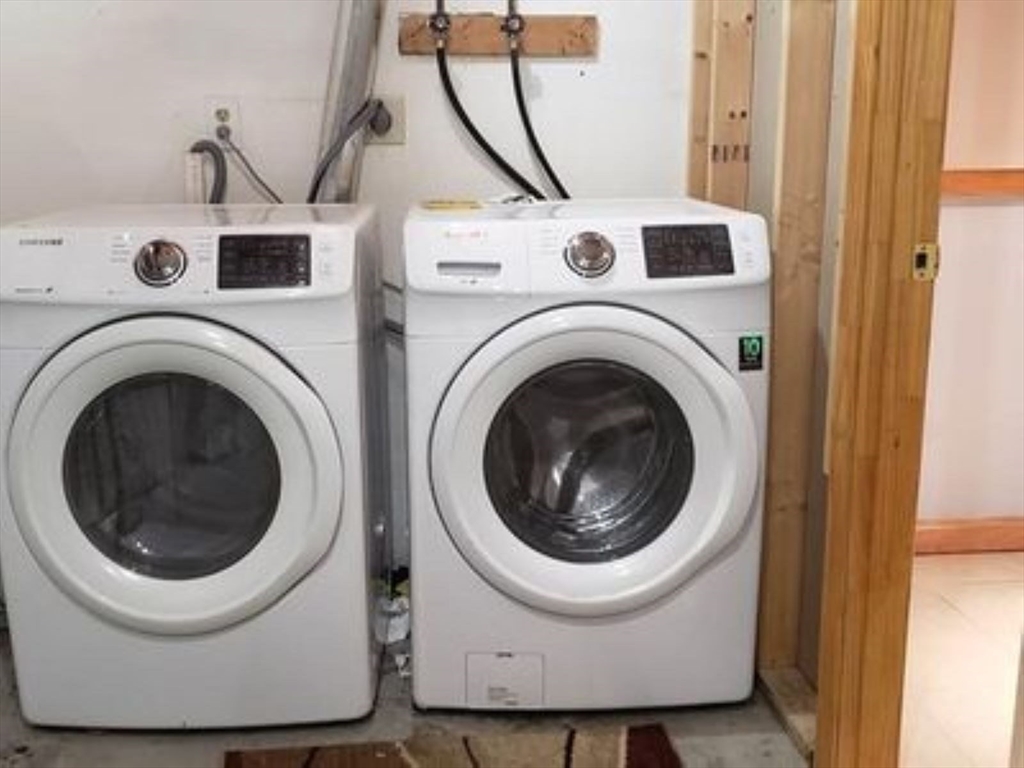 360 Littleton Road, Unit G10 Chelmsford, MA 01824 - Photo 9 of 20 a utility room with dryer and washer