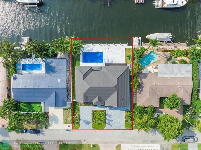 1950 Waters Edge Lauderdale-by-the-Sea, FL 33062 - Photo 29 of 38 an aerial view of a house with a yard