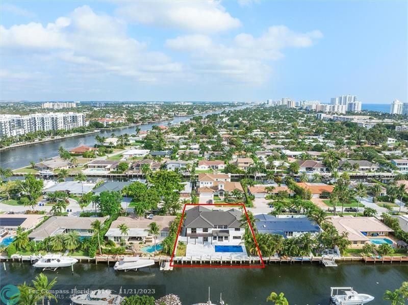 1950 Waters Edge Lauderdale-by-the-Sea, FL 33062 - Photo 32 of 38 an aerial view of residential building and lake