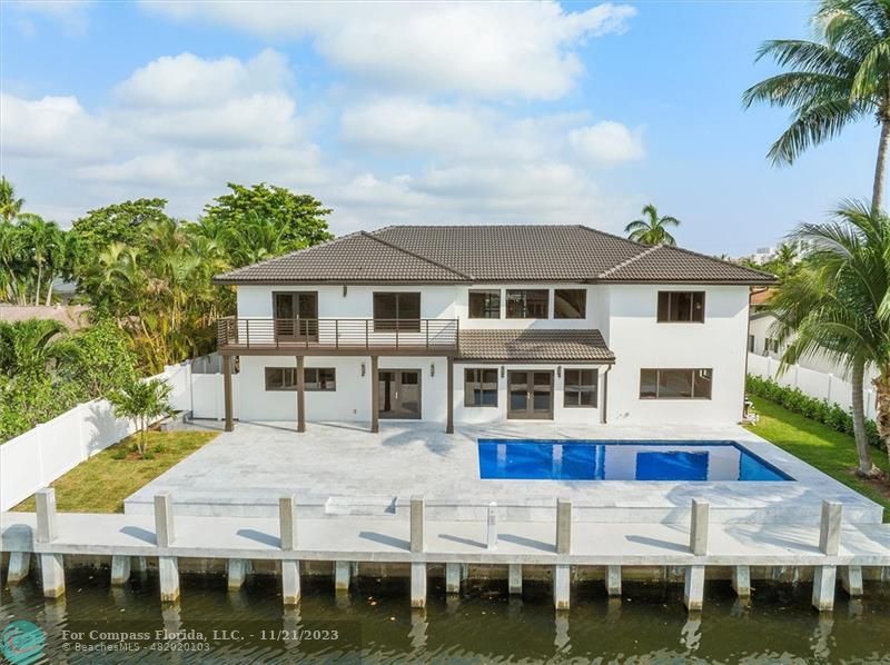 1950 Waters Edge Lauderdale-by-the-Sea, FL 33062 - Photo 34 of 38 a aerial view of a house with a yard table and chairs