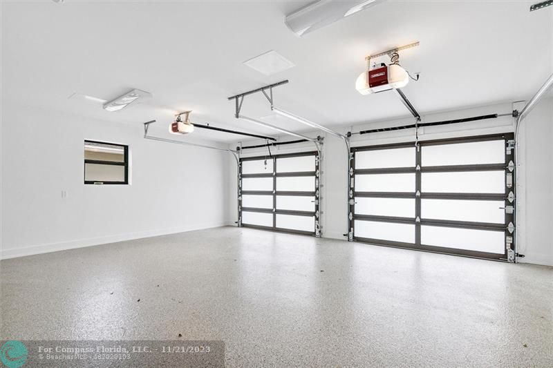 1950 Waters Edge Lauderdale-by-the-Sea, FL 33062 - Photo 37 of 38 a view of a livingroom with wooden floor and a window