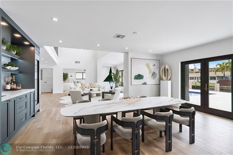 1950 Waters Edge Lauderdale-by-the-Sea, FL 33062 - Photo 9 of 38 a view of a dining room with furniture window and wooden floor