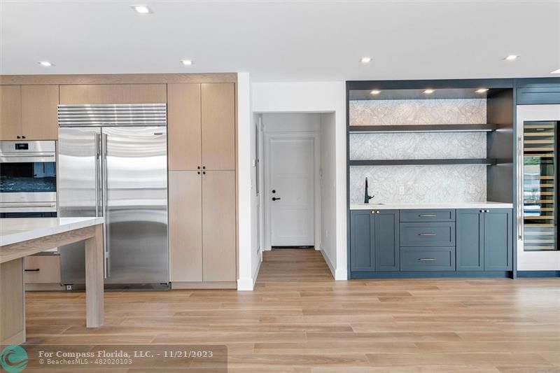 1950 Waters Edge Lauderdale-by-the-Sea, FL 33062 - Photo 10 of 38 a view of a kitchen with a sink and a refrigerator