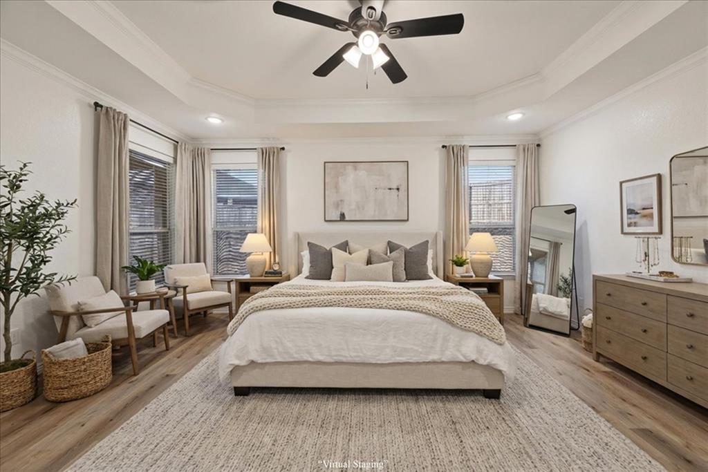 313 Nutmeg Court Burleson, TX 76028 - Photo 19 of 40 a spacious bedroom with a large bed and windows