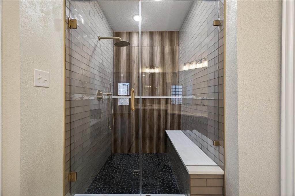 313 Nutmeg Court Burleson, TX 76028 - Photo 24 of 40 a bathroom with a shower