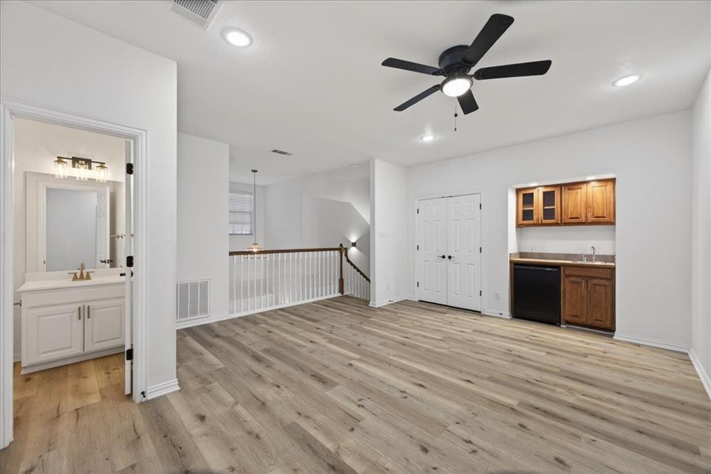 313 Nutmeg Court Burleson, TX 76028 - Photo 29 of 40 a view of a livingroom with a kitchen
