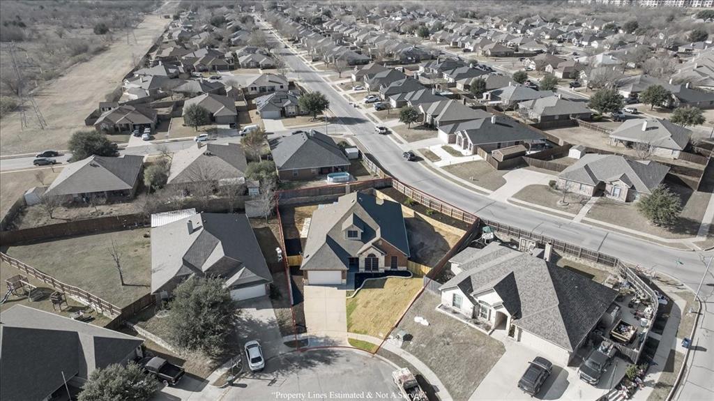 313 Nutmeg Court Burleson, TX 76028 - Photo 38 of 40 an aerial view of a house with a lot of trees