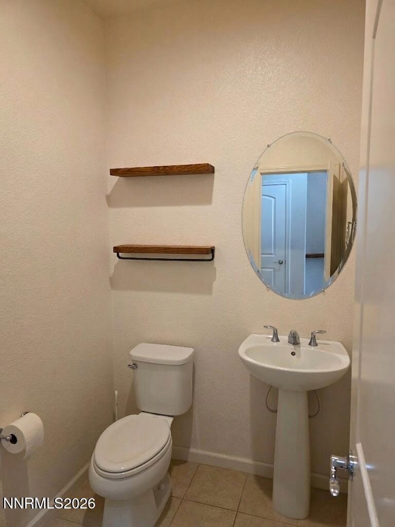 2775 Bonfire Lane Reno, NV 89521 - Photo 18 of 41 a bathroom with a toilet sink and mirror