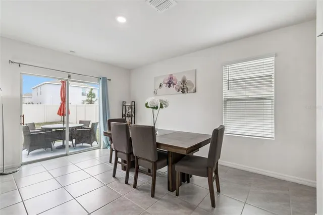 a view of a workspace with furniture and a chair