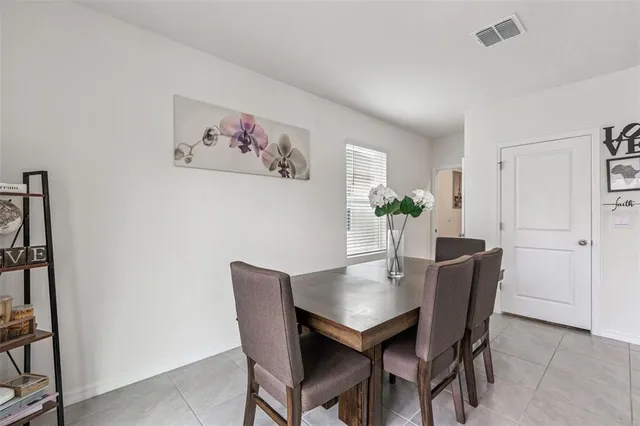 a bathroom with a double vanity sink and mirror