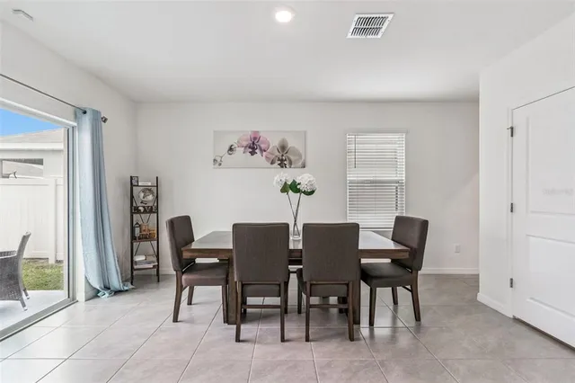 a living room with furniture and a gate